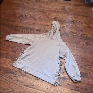 Cute sweatshirt with gold snaps on side and ribbon detail